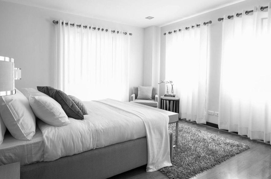 Bedroom with sheer curtains