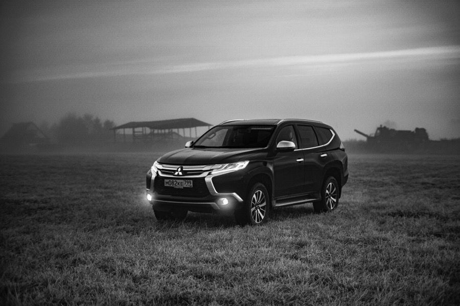 SUV parked in an open field
